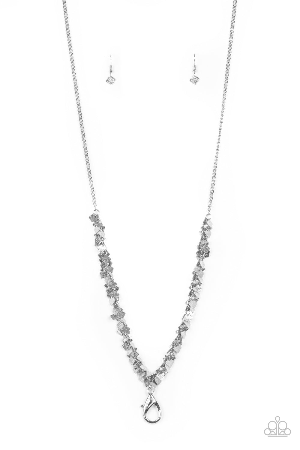Item #P2LN-SVXX-110XX Delicately hammered in shimmer, dainty silver square frames cluster along the bottom of a classic silver chain, creating a noisy fringe. A lobster clasp hangs from the bottom of the design to allow a name badge or other item to be attached. Features an adjustable clasp closure. Sold as one individual lanyard. Includes one pair of matching earrings.