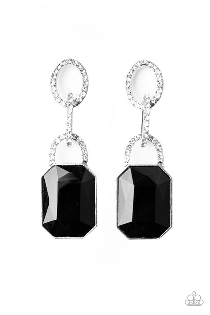 An oversized black emerald-cut rhinestone swings from the bottom of white rhinestone encrusted links, creating a gorgeously dramatic lure. Earring attaches to a standard post fitting.  Sold as one pair of post earrings.