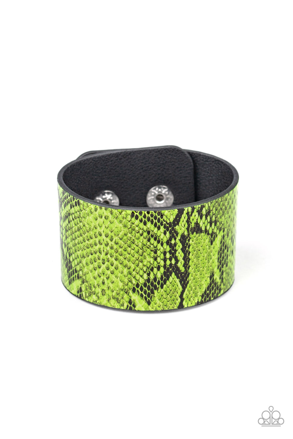 Item #P9SE-URGR-146XX Featuring neon green python print, a thick leather band wraps around the wrist for a colorfully wild look. Features an adjustable snap closure.  Sold as one individual bracelet.